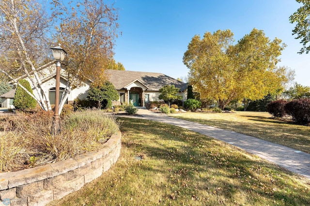 view of front facade with a front lawn