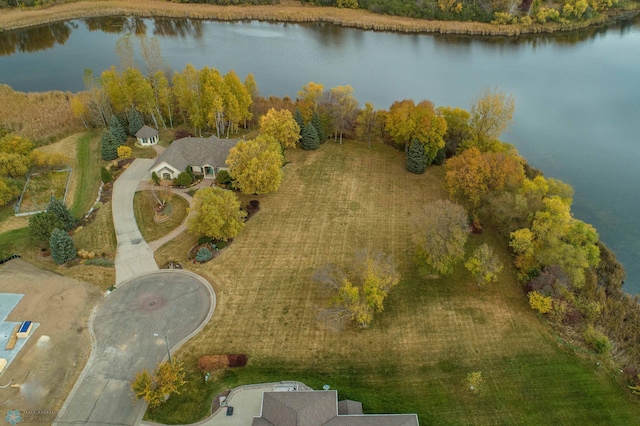 drone / aerial view with a water view