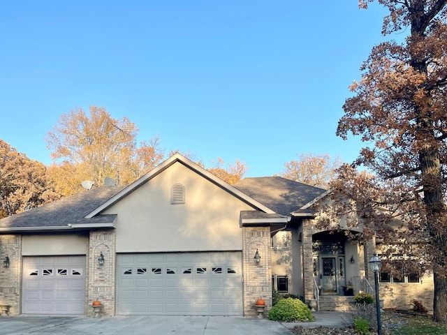 view of front of property featuring a garage