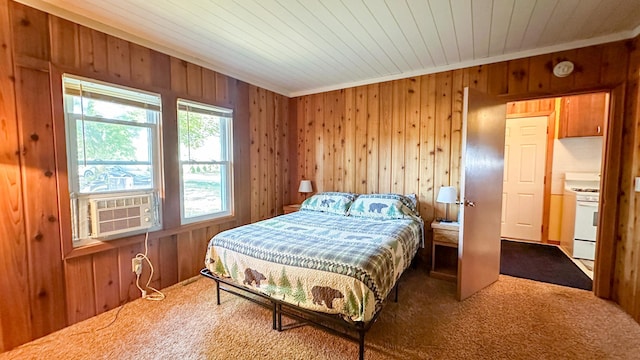 bedroom with carpet floors, cooling unit, wood walls, and wooden ceiling