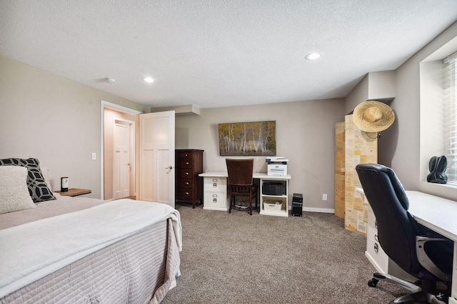 bedroom with carpet floors, recessed lighting, and a textured ceiling