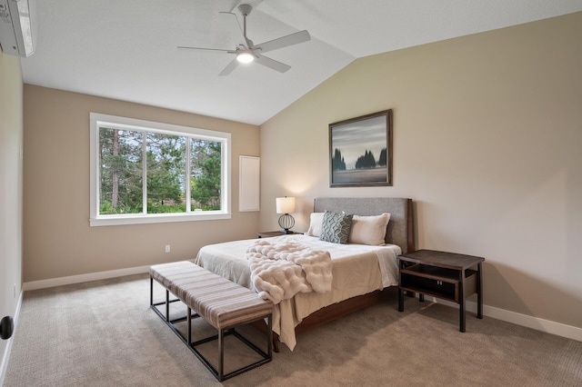 bedroom featuring ceiling fan, light colored carpet, vaulted ceiling, and an AC wall unit