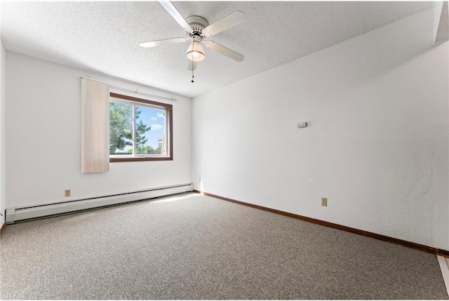 carpeted spare room with ceiling fan, a textured ceiling, and baseboard heating