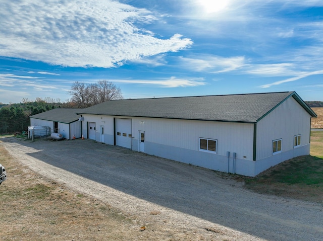 view of outdoor structure featuring an outbuilding