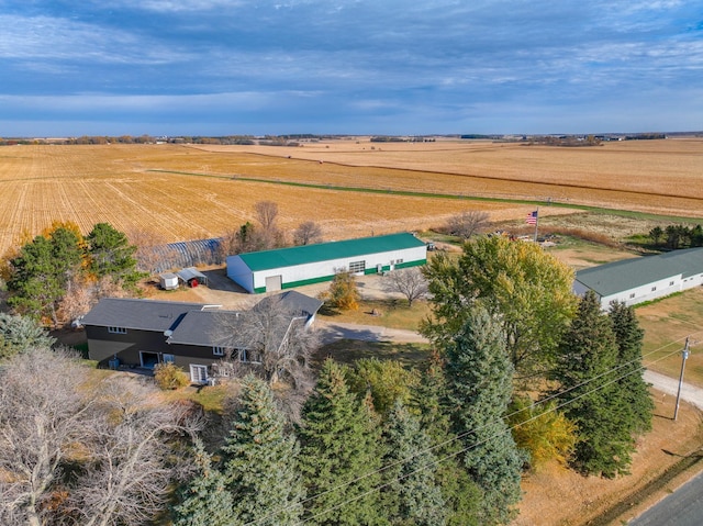 birds eye view of property with a rural view