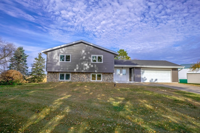 exterior space with driveway and an attached garage