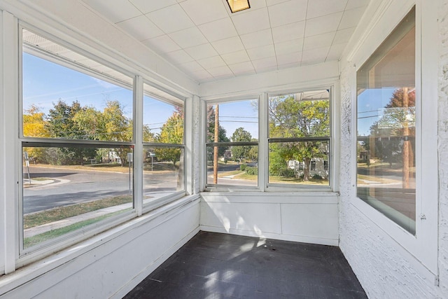 unfurnished sunroom with a healthy amount of sunlight