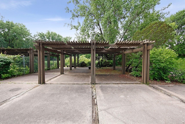 view of parking / parking lot with a carport