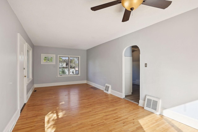 unfurnished room featuring light hardwood / wood-style floors and ceiling fan