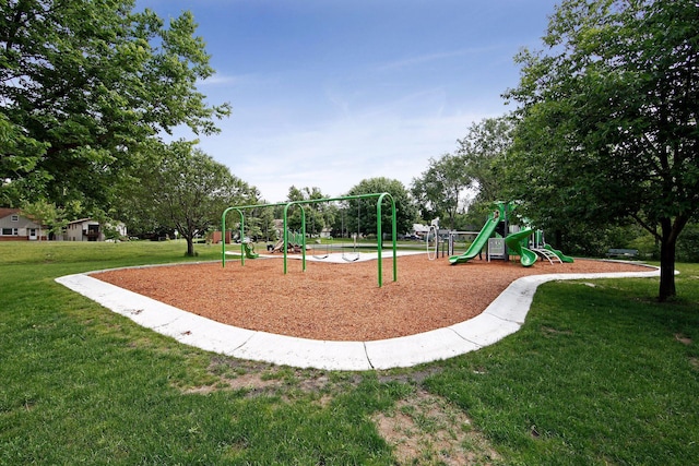 view of jungle gym featuring a lawn