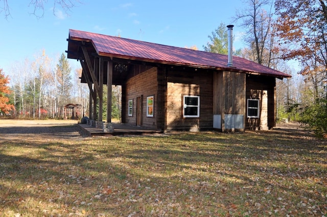 exterior space with a yard