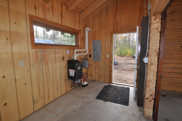 31071 State 34, Akeley Twp, MN 56433 - doorway to outside with concrete flooring, electric panel, vaulted ceiling, and wood walls