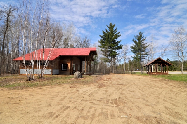 31071 State 34, Akeley Twp, MN 56433 - view of home's exterior featuring a gazebo and metal roof