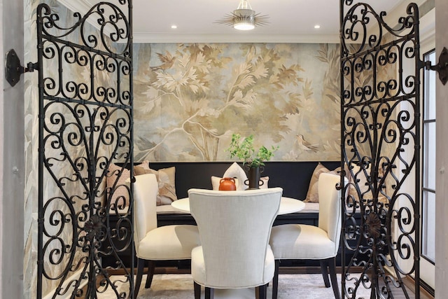 dining room featuring ornamental molding