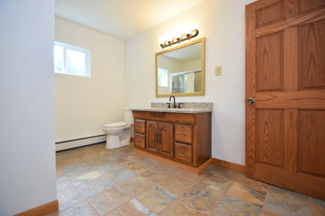 full bathroom featuring vanity, baseboards, an enclosed shower, a baseboard heating unit, and toilet