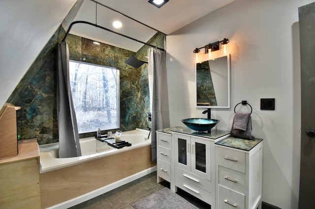 bathroom with vanity, tile patterned floors, and shower with separate bathtub