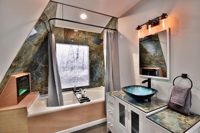 bathroom with vanity, shower with separate bathtub, and tile patterned flooring