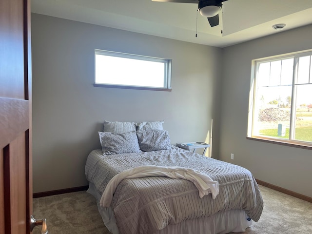 3106 Bassett Dr, Mankato, MN 56001 - carpeted bedroom with baseboards and a ceiling fan