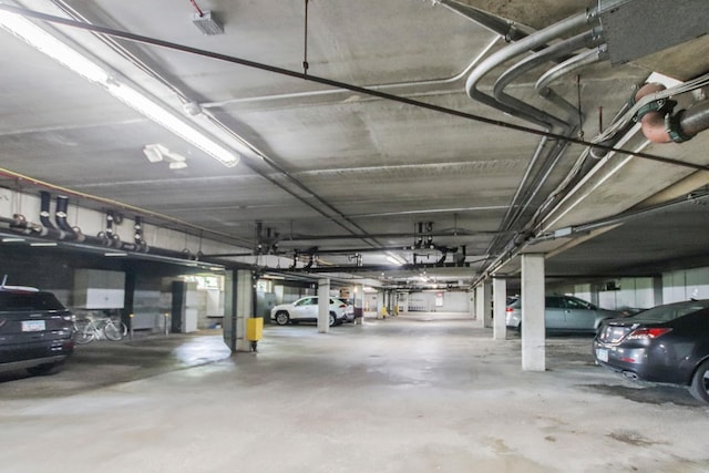 garage featuring a carport