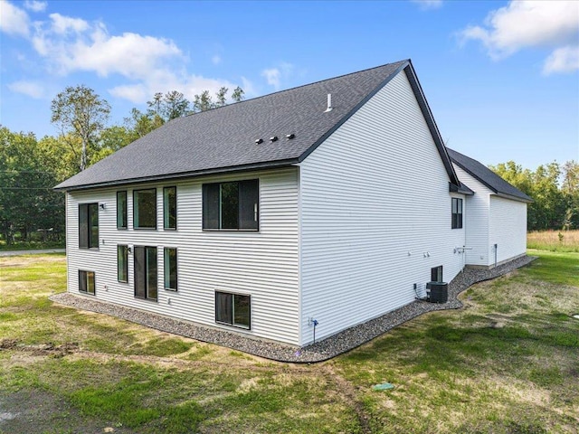 view of property exterior featuring a yard