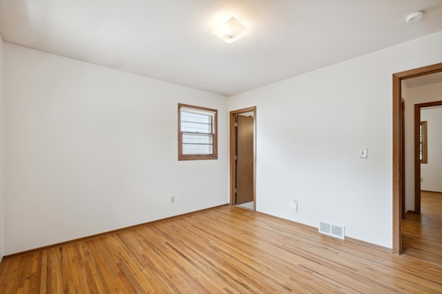 empty room featuring light hardwood / wood-style floors