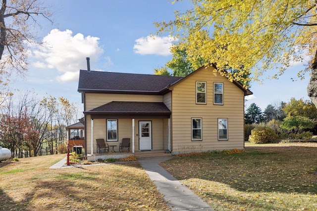 view of property featuring a front yard