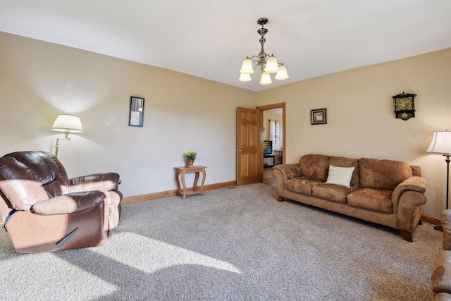 living room with carpet floors and a chandelier