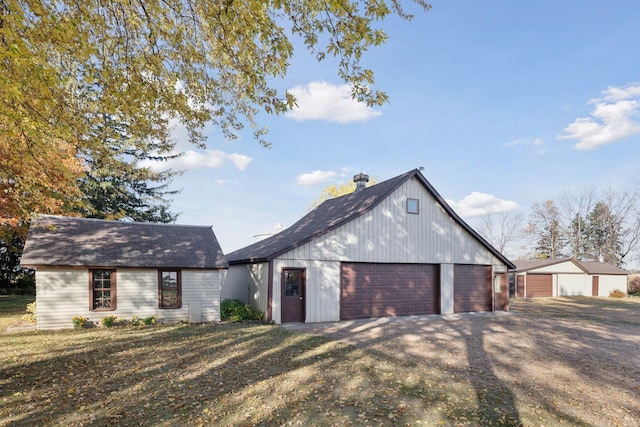 modern inspired farmhouse featuring a garage