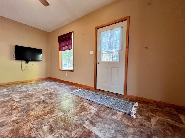 entryway featuring ceiling fan