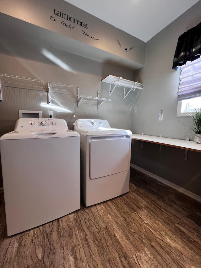 washroom featuring independent washer and dryer and dark wood-type flooring