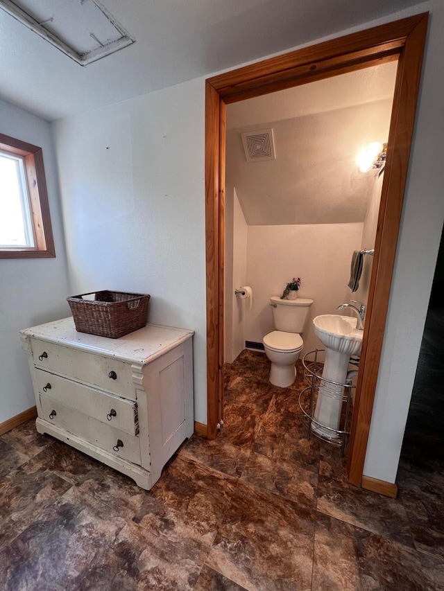 bathroom with toilet and sink