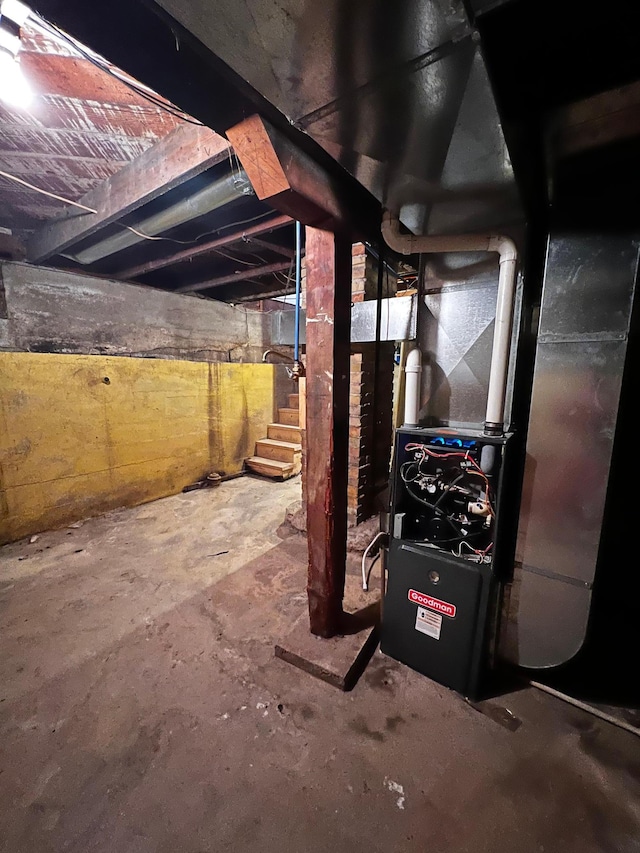 utility room with heating unit