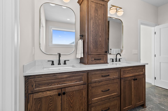 bathroom with double vanity and a sink