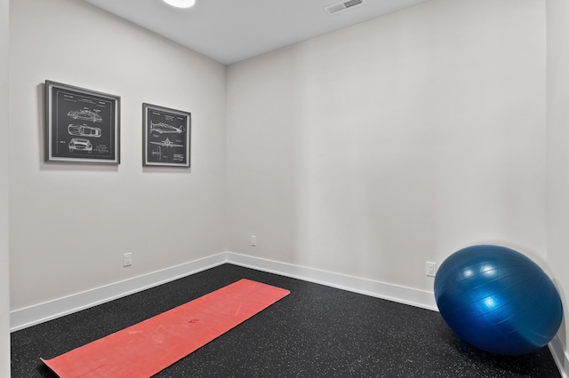 workout area featuring baseboards and visible vents