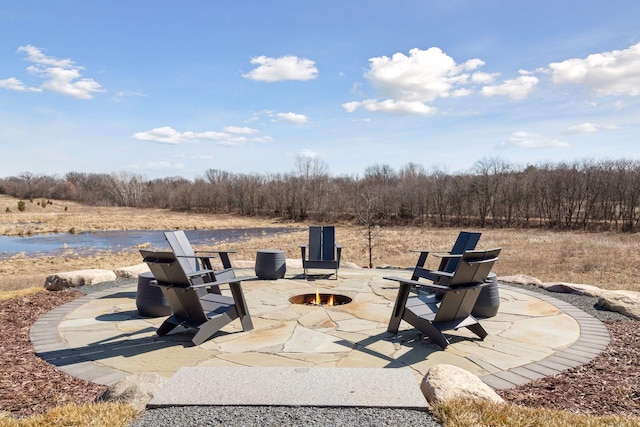 view of patio featuring an outdoor fire pit