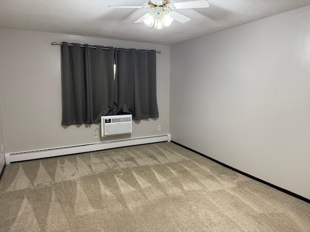 empty room with a wall unit AC, carpet floors, a baseboard radiator, a textured ceiling, and ceiling fan