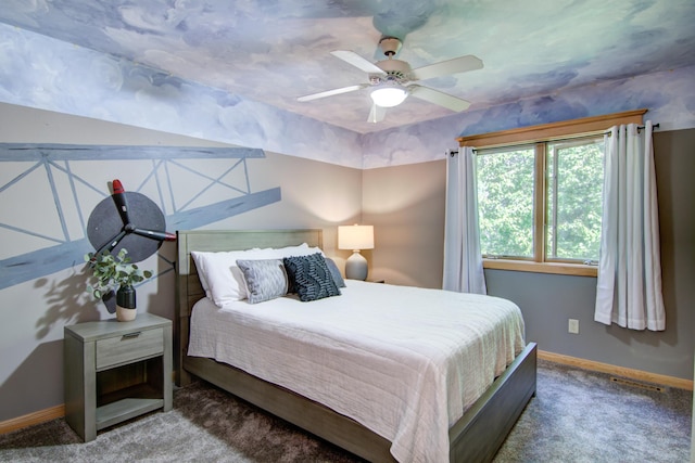 bedroom with ceiling fan and carpet floors