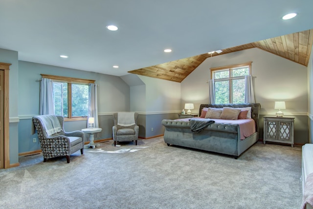 carpeted bedroom featuring wood ceiling and vaulted ceiling