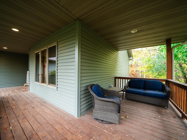 wooden terrace featuring an outdoor hangout area