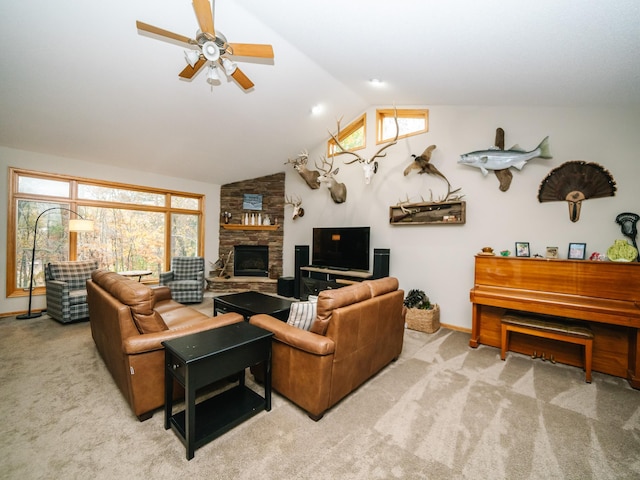 living room featuring light carpet, lofted ceiling, and a wealth of natural light