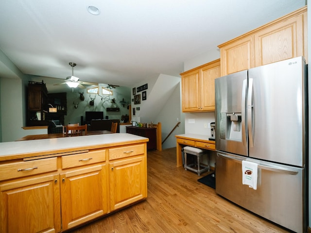 kitchen featuring ceiling fan, light hardwood / wood-style floors, light brown cabinets, and stainless steel refrigerator with ice dispenser