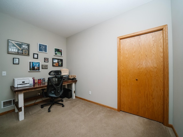 home office featuring light colored carpet