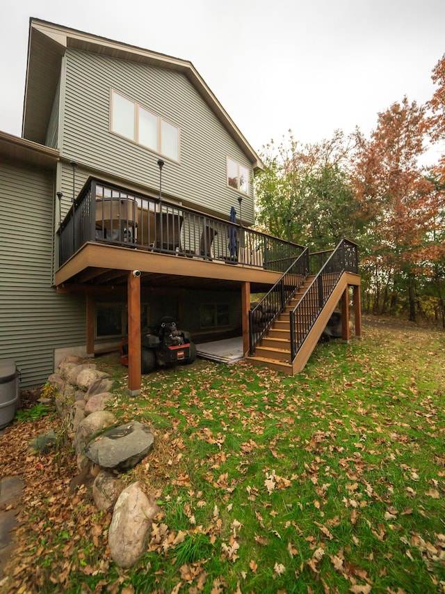 back of house featuring a wooden deck