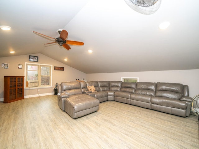 living room featuring ceiling fan, lofted ceiling, light hardwood / wood-style flooring, and cooling unit