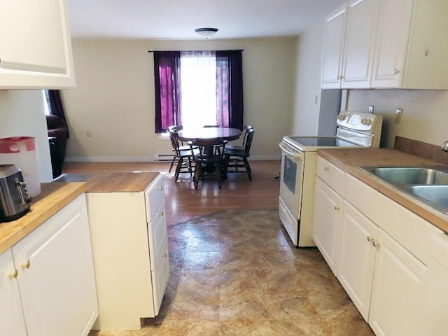 kitchen featuring white electric stove, sink, light hardwood / wood-style floors, a baseboard heating unit, and white cabinetry