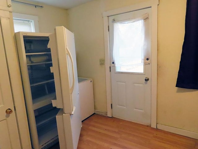 doorway featuring light hardwood / wood-style floors