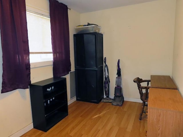 office space with light hardwood / wood-style floors