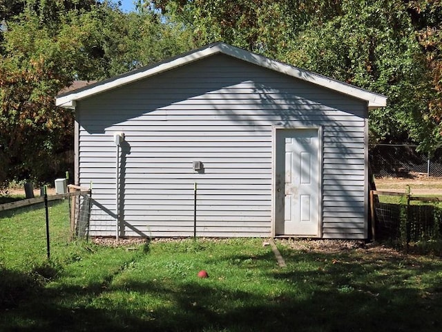 view of outdoor structure with a yard