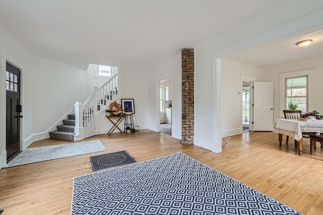 foyer with hardwood / wood-style flooring