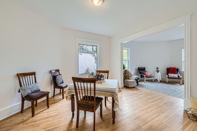 dining room with light hardwood / wood-style flooring